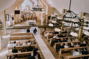 Reportaz-slubny-Bydgoszcz-Kosciol-NMP-Wspomozycielki-Wiernych-Niemcz-fotografia-slubna-Swietliste-fotografujemy-emocje-Torun-Hotel-Palac-Myslecinek-Paulina-Radek-053